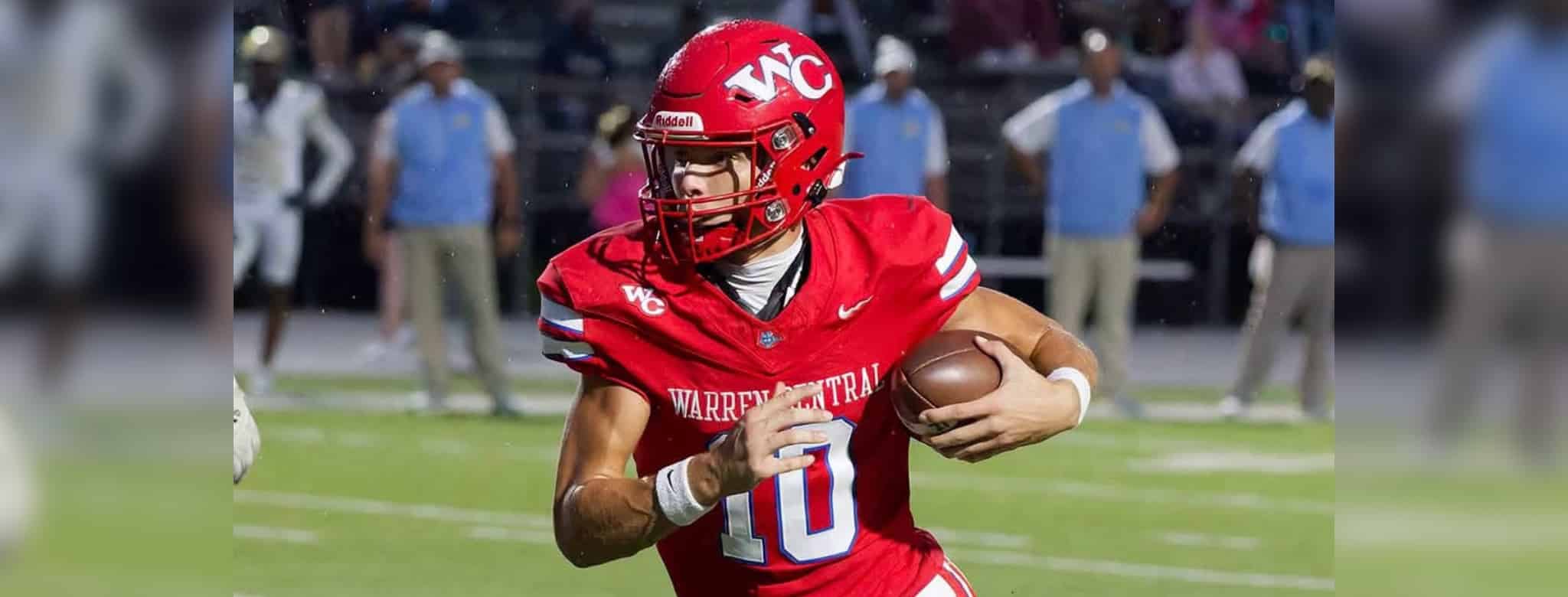 Warren Central quarterback Nash Morgan running with the football during a game against Madison Central.