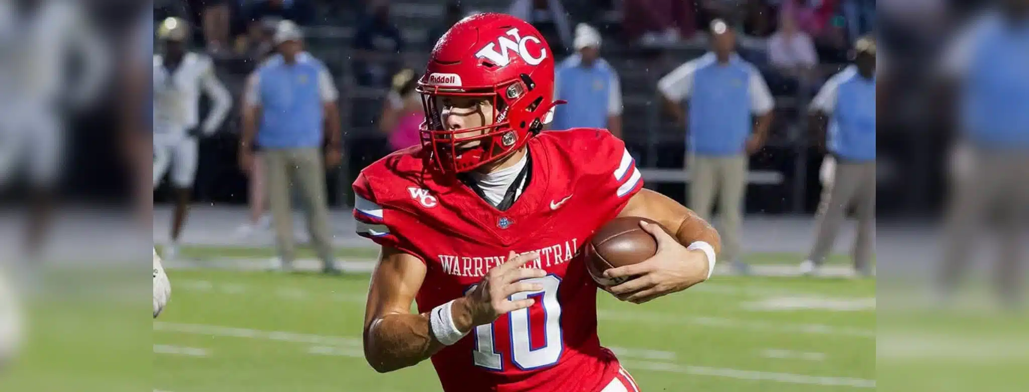 Warren Central quarterback Nash Morgan running with the football during a game against Madison Central.