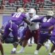 Alcorn State University football players in purple jerseys compete against Tex — Alcorn defeats Texas Southern in overtime