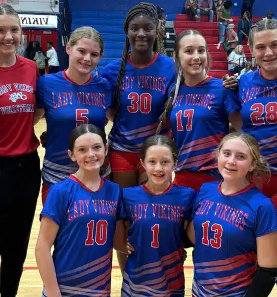 WCJHS volleyball team poses for a group photo in their colorful uniforms — WCJHS volleyball takes two wins over Vicksburg