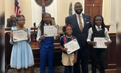 group shot — Alderman honors four students