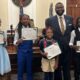 group shot — Alderman honors four students