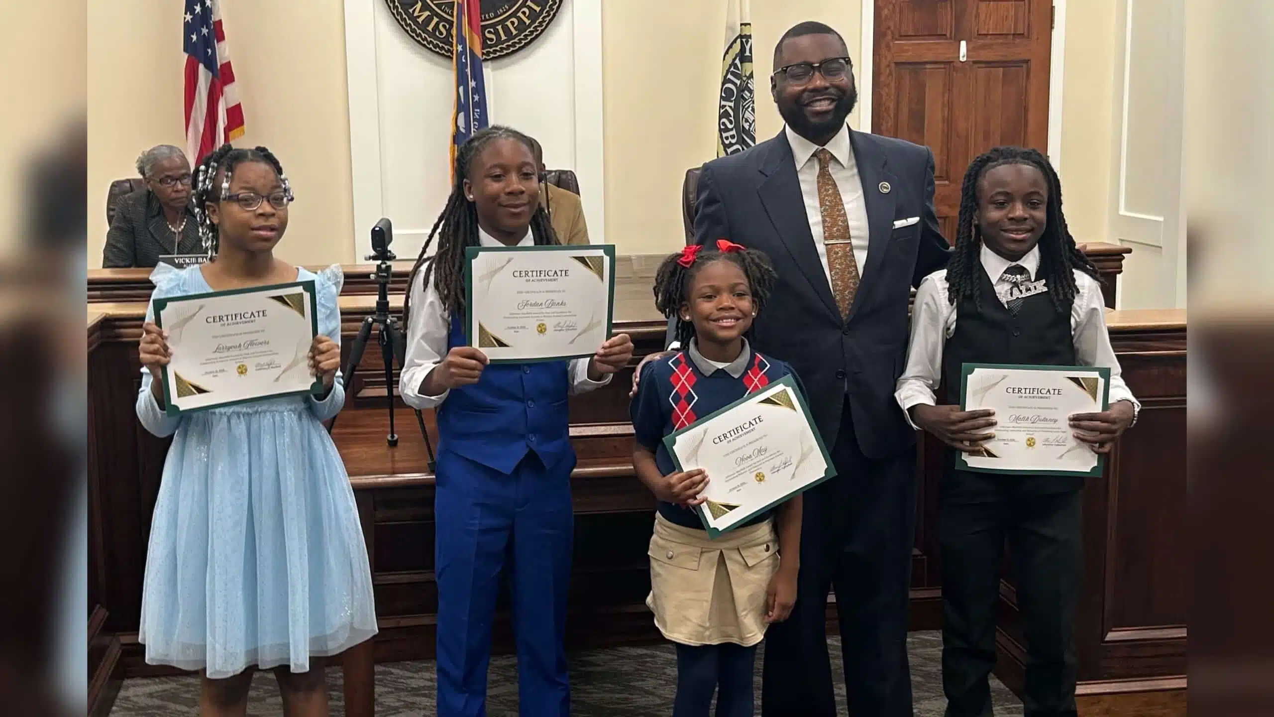 group shot — Alderman honors four students