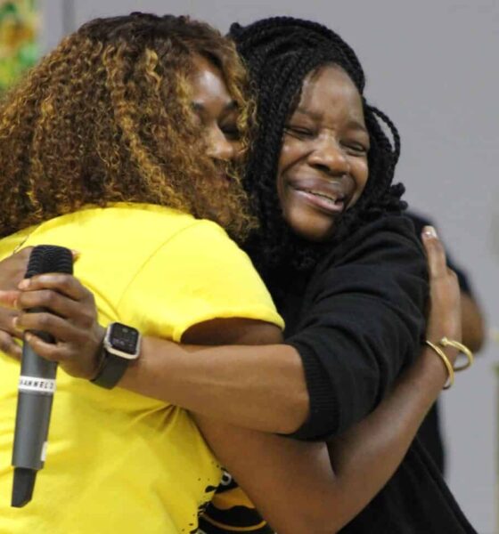 Dana Road Elementary celebrates B rating as two women embrace in — Dana Road Elementary celebrates B rating with students