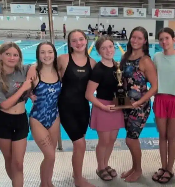 Warren Central girls swim team celebrating their North State championship win at De — Warren Central wins North State swim