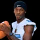 A football player in a blue and white jersey poses confidently with a football — Port Gibson defeats Franklin County 30-21