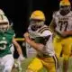 A St. Aloysius Junior High football player runs — St. Aloysius Junior High dominates Central Hinds 28-0 for third shutout