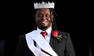 Mason Watts wearing a crown and sash, smiling proudly at his Homecoming King coronation. — Mason Watts homecoming king