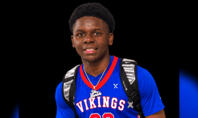 WC freshmen Ridgeland player in a blue Vikings basketball jersey with a backpack against a black background.