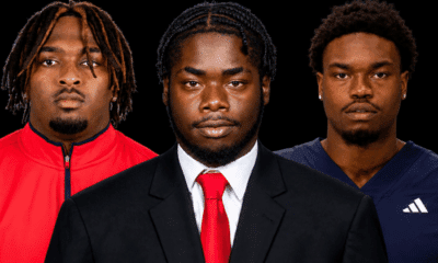 Three defensive linemen from Vicksburg in formal attire, showcasing their athleticism and teamwork.