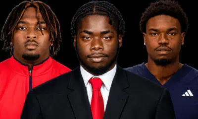 Three defensive linemen from Vicksburg in formal attire, showcasing their athleticism and teamwork.