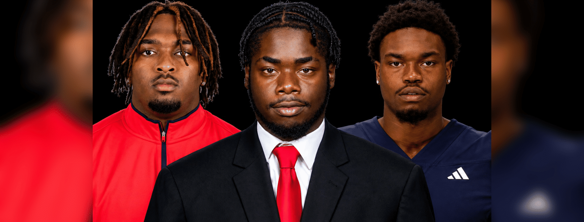 Three defensive linemen from Vicksburg in formal attire, showcasing their athleticism and teamwork.