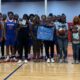 Warren Central High School basketball team and family memb — Warren Central honors the life and legacy of Henry Trisby III