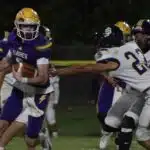 A quarterback in a purple — Gattle’s late touchdown lifts St. Aloysius past Madison St. Joe in thrilling homecoming win