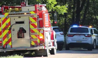 Emergency vehicles at the scene of a UTV accident in Warren County, with a fire truck and police cars visib — Child killed