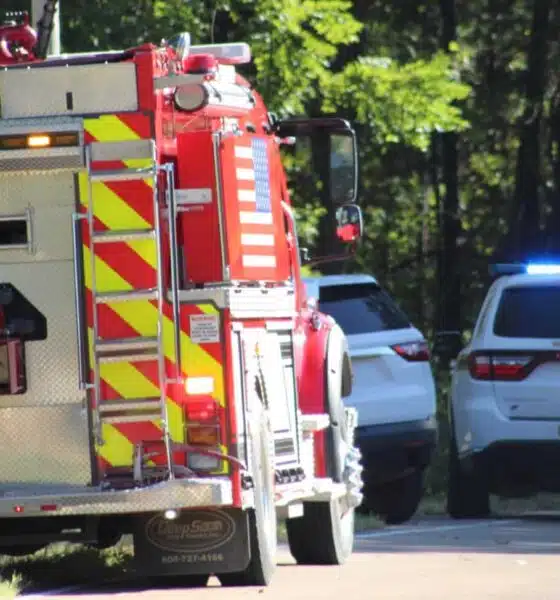 Emergency vehicles at the scene of a UTV accident in Warren County, with a fire truck and police cars visib — Child killed