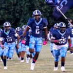 Port Gibson High School football team running onto the field, showcasing team spirit and en — Port Gibson Jefferson County