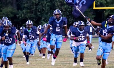 Port Gibson High School football team running onto the field, showcasing team spirit and en — Port Gibson Jefferson County