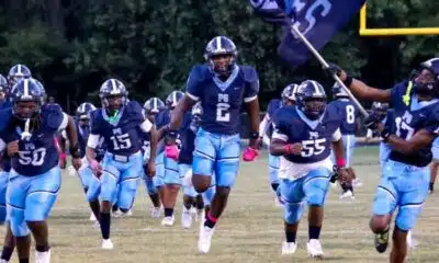 Port Gibson High School football team running onto the field, showcasing team spirit and en — Port Gibson Jefferson County