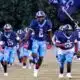 Port Gibson High School football team running onto the field, showcasing team spirit and en — Port Gibson Jefferson County