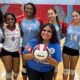 Warren Central volleyball seniors pose together with a volleyball on Senior Night, celebrating their achievements. — Swept