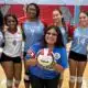 Warren Central volleyball seniors pose together with a volleyball on Senior Night, celebrating their achievements. — Swept