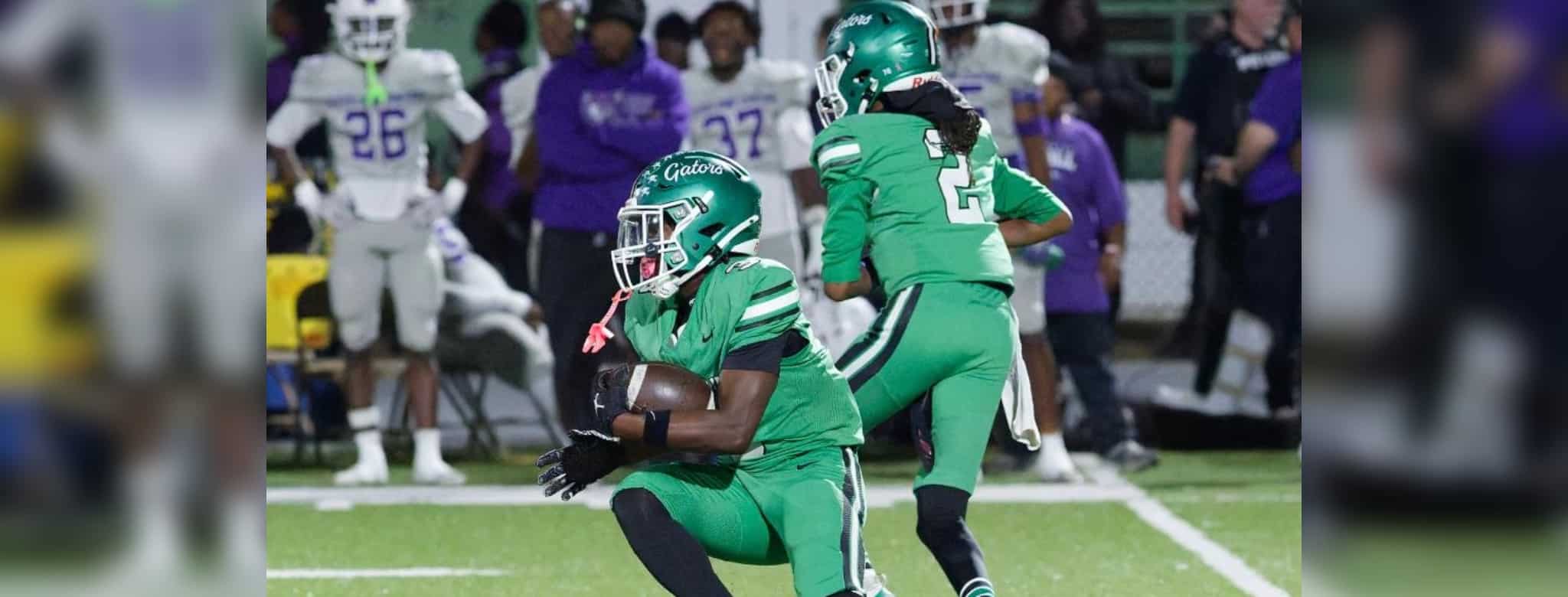 Gators 28-26 Cleveland Central: Vicksburg players in green uniforms celebrate on the field as opponents look on.